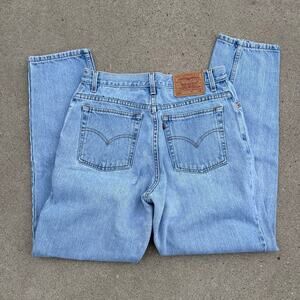 Vintage 90s Levi's 550 Relaxed Fit Tapered Leg Light Blue Jeans Size 12 Reg M